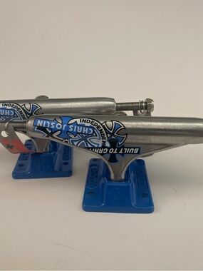 Silver & Blue Skateboard Trucks